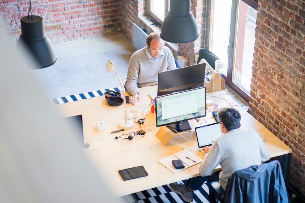 People Working In An Office Pictured From Above